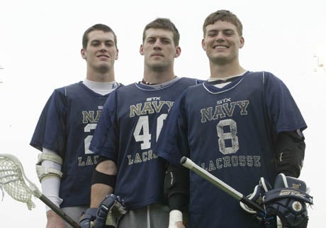Brendan (middle) flanked by brothers Stephen and Billy on the Navy lacrosse team. 