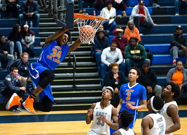 East St. Louis (III.) forward Terrance Hargrove finishes a monster dunk against Belleville East.