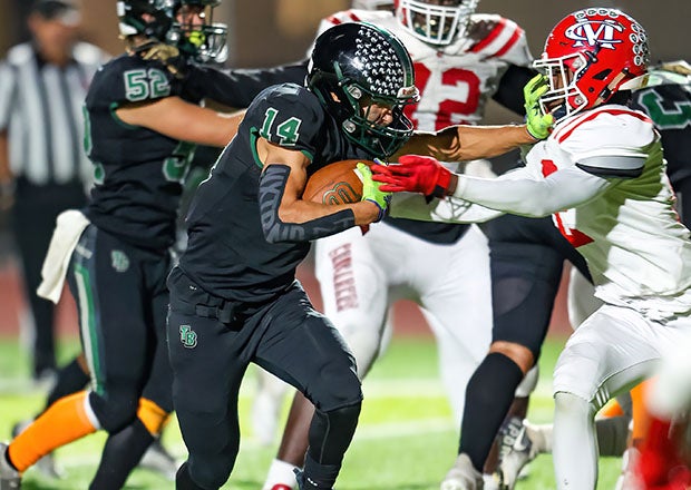 MaxPreps California High School Football Player of the Week Nathan Crawford grinds out tough yards for Twelve Bridges during a playoff game against Modesto Christian last season. (Photo: Steve Cason)