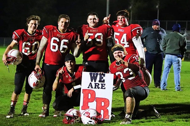 Cameron Lee (60) isn't your prototypical lineman. At 160 pounds, Lee uses his strength and great tehchique to move bodies in the trenches for his Pearl River football team.