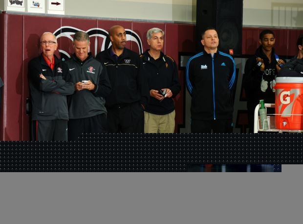 A number of big time college coaches were on hand Monday night at Rancho Mirage High School, including Steve Fisher of San Diego State (far left) and Lorenzo Romar of Washington (third from left).