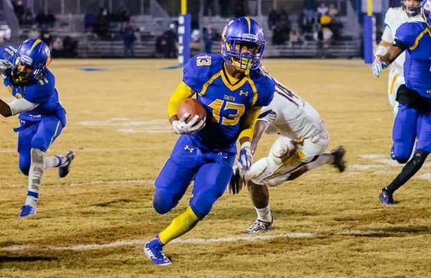 Oscar Smith running back Deangelo White carries.