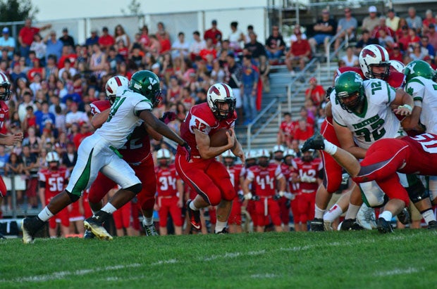 James Young (32) has rushed for 17 touchdowns this season and has led New Palestine to a 7-0 record. 