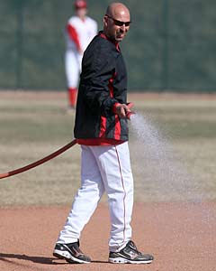 Weiss waters the field before his team's
home game.