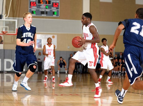 Chris Idi, Fort end Travis starting junior guard made four pivotal free throws down the stretch in MaxPreps Holiday Classic semifinal win over Loyola.
