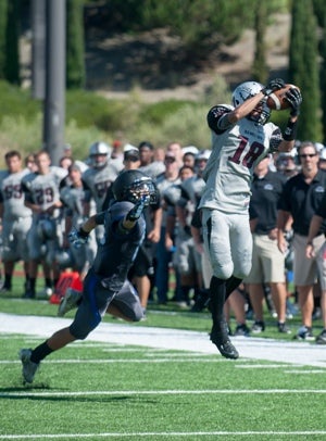 Hamilton's Kyeler Burke hauls in a catch Saturday.