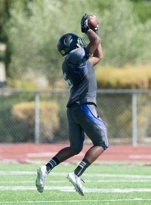 Eastlake's Isiah Olave hauls in an interception.