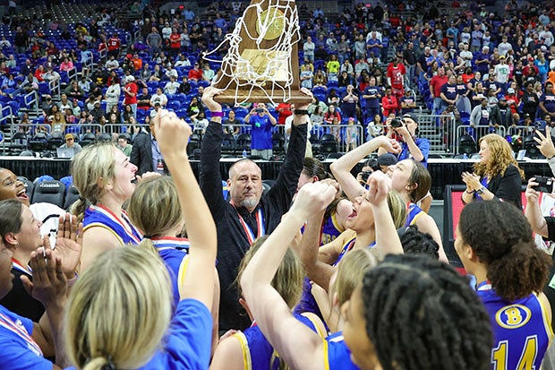 Head coach Jeremy Durham and his Bearettes of Brownsboro celebrate a win in the Texas Class 4A state championship game.