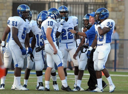 Armwood coach Sean Callahan instructs his very relaxed and confident squad.