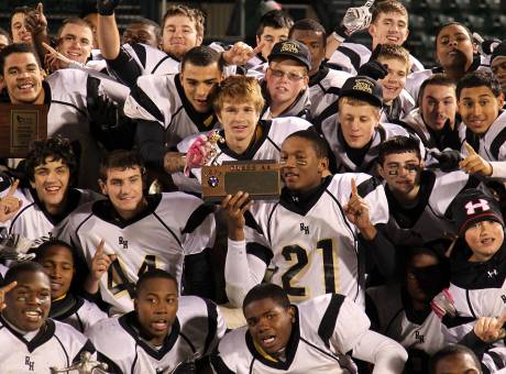 Chauncey Scissum (holding plaque) is our pick as one of the state's top defensive backs.