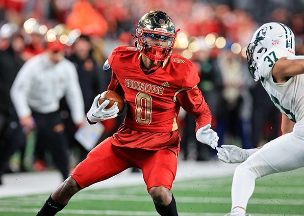 MaxPreps New Jersey Player of the Year Quincy Porter looks to shake a defender in the state championship game. (Photo: Andee Fagan)