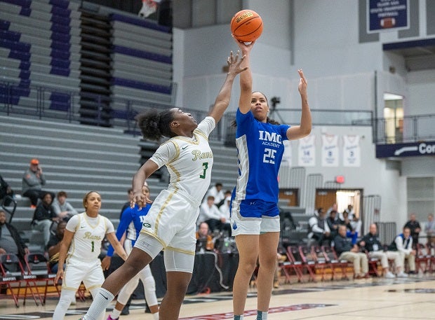 IMG Academy's Deniya Prawl scores over Grayson's Danielle Carnegie on Thursday in the Ascenders' 65-56 win in their Chipotle Nationals semifinal on Friday. IMG takes on Montverde Academy on Saturday in the finals. (Photo: Julie Brown)
