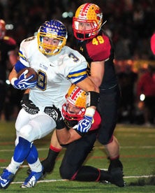 El Toro couldn't get away from the
Mission Viejo defense all night.
