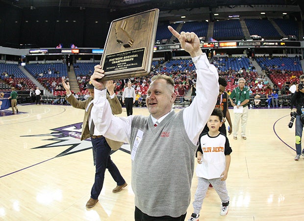 Berkeley coach Mark DeLuca celebrates Berkeley's first Northern California championship of the modern era.