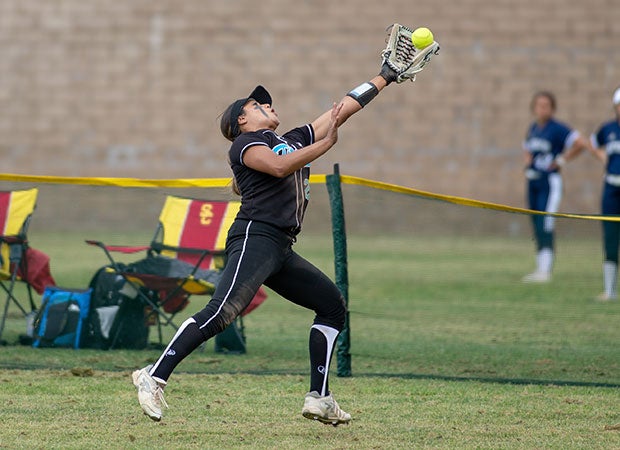 Grand Terrace (Calif.) outfielder Alycia Flores makes a running one-handed catch against Great Oak in the Michelle Carew Classic.