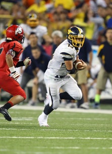 Ryan Tuiasoa tried to keep Punahou
in the game with three TD runs
but it wasn't nearly enough.