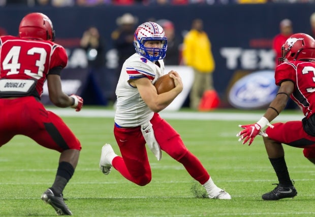 Sam Ehlinger looks to run in last year's state championship game.