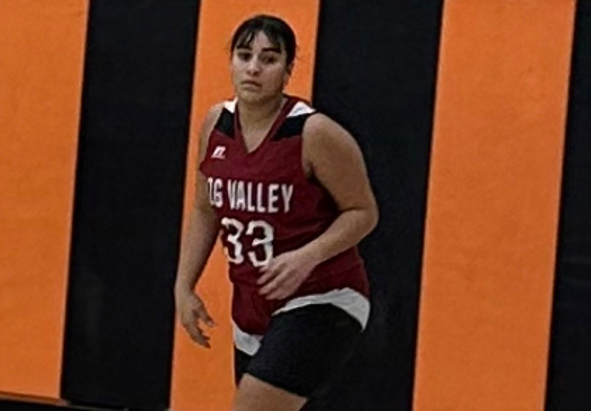 After Big Valley didn't have enough players to field a girl's basketball team, TzinTzintli Moya joined the boys squad. She had 11 points in one game and is the first player off the bench. (Photo: Rachael Rogers)
