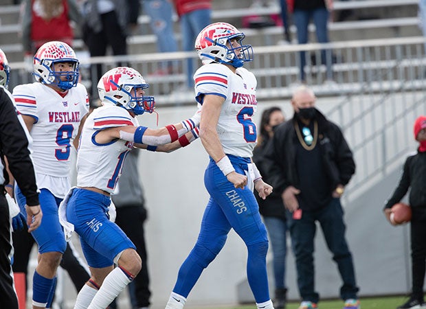 Westlake quarterback Cade Klubnik celebrates his game-winning rushing touchdown with teammates late in the fourth quarter.