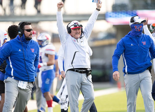 Westlake head coach Todd Dodge celebrates his team's 24-21 upset over No. 2 North Shore on Saturday.