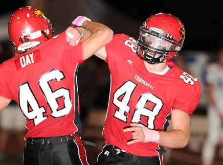 Kevin Day (46) and Hunter Gregg (48) were two of the defensive standouts who locked horns for Chaparral on Monday.  
