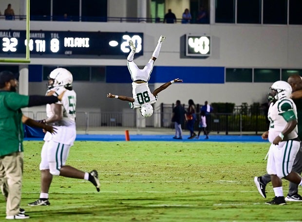 Miami Central player Sekou Smith Jr. celebrates the Rockets' 20-14 upset of IMG Academy.