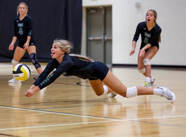 Tioga's Lauren Sheppard dives for a ball with style in a match with Valley View in the Denison Showcase Invitational.