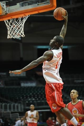 Kenny Boynton flies in for a dunk at Tuesday's practice.