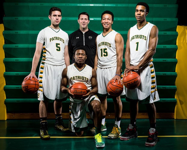 Head coach Pat Ambrose is surrounded by seniors (left to right) Parker Nichols, Matt Johnson, Jalen Brunson and Connor Cashaw.  