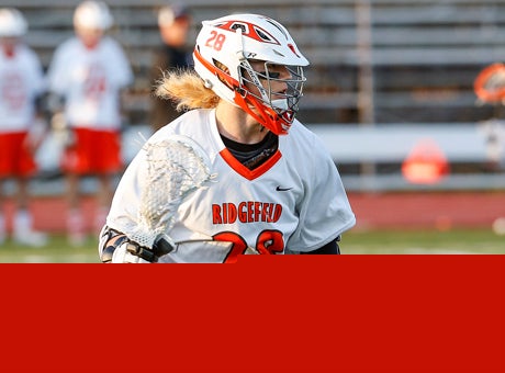 Brad Alexander carries onto attack for Ridgefield during last week's game against perennial NYSPHSAA contender Yorktown.