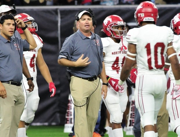 Head coach Jon Kay instructs his North Shore Mustangs during a November playoff game with Houston-area rival Katy.