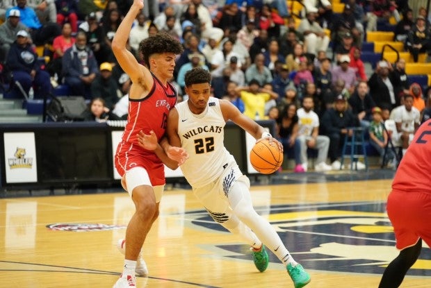 Top-ranked sophomore Cameron Boozer plays defense against USC signee Arrinten Page. (Photo: Michael Mixon)