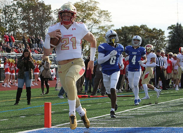 Bergen Catholic (N.J.) quarterback Johnny Langan crosses the goal line for a touchdown against Seton Hall Prep.