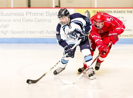 Ralston Valley forward Austin Resseguie (white jersey) said a close-knit Mustangs hockey team could be better than the one that won the state title last season. RV has gone 14-0 this season.