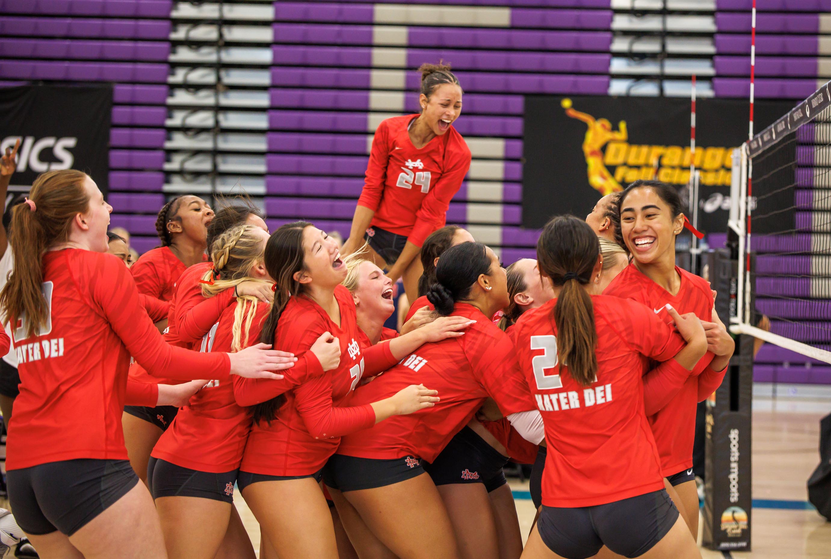 Mater Dei players celebrate their Durango Fall Classic final win over No. 1 Sierra Canyon. It was the third title in four years for the Monarchs at volleyball's deepest tournament. (PHOTO: Jenni Webber)