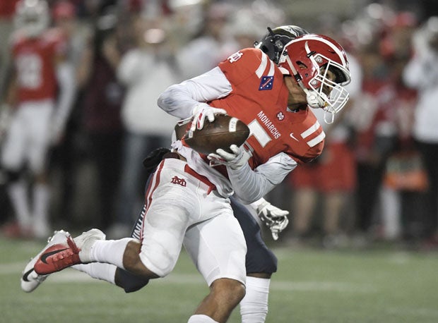 Mater Dei athlete Bru McCoy hauls in a pass in the Monarchs' Oct. 13 meeting with St. John Bosco. The squads meet for the third straight year in the Southern Section Division I title game.