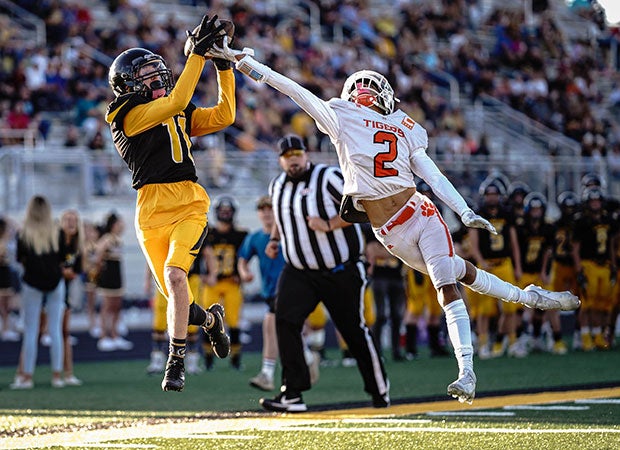 Union (Utah) receiver Chandler Culp makes a leaping touchdown catch in front of Ogden cornerback Jaden Gallegos.