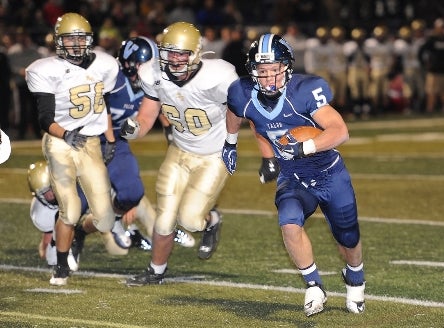 Valor Christian junior Christian McCaffrey (5) ran away from opponents for 1,153 yards and 22 touchdowns last season in leading the Eagles to their third consecutive state title. This season Valor Christian moves up to Class 5A, Colorado's largest classification.