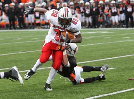 Sa'veon Holloway is an important piece of the McKinley offense. He's looking to break away from the Washington defense, like in this photo from last season's matchup.