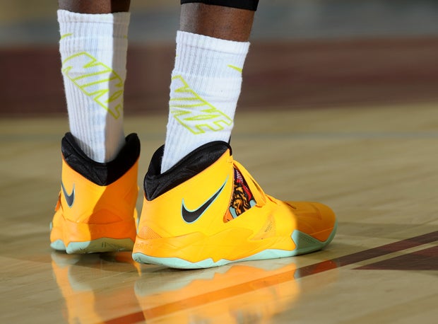 The bright and flashy orange shoes of Wenonah's boys basketball team, which fits its persona exactly.