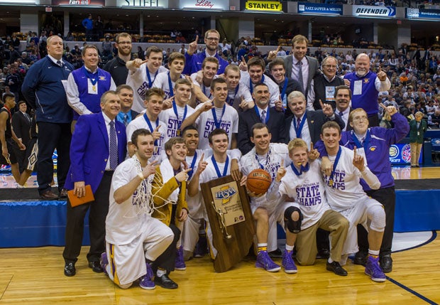 The MaxPreps Indiana Team of the Week, Guerin Catholic, takes a state championship picture on Saturday after a 62-56 win over Griffith at Bankers Life Fieldhouse.