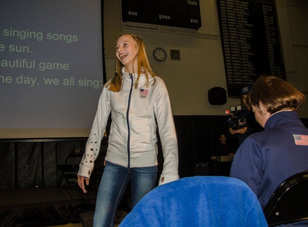 Polina Edmunds wasn't bashful approaching the podium in front of almost 2,000 of her classmates Friday.