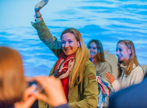 Kerri Walsh-Jennings waves as Polina Edmunds and Brandi Chastain look on behind. She told Edmunds: "Everything you need is already inside of you."