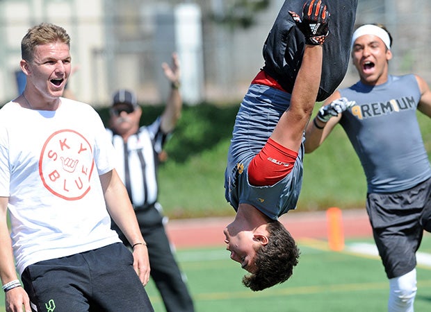A player does a flip while celebrating a touchdown during the Best of the West Elite 7ON7 Finals in Southern California. 