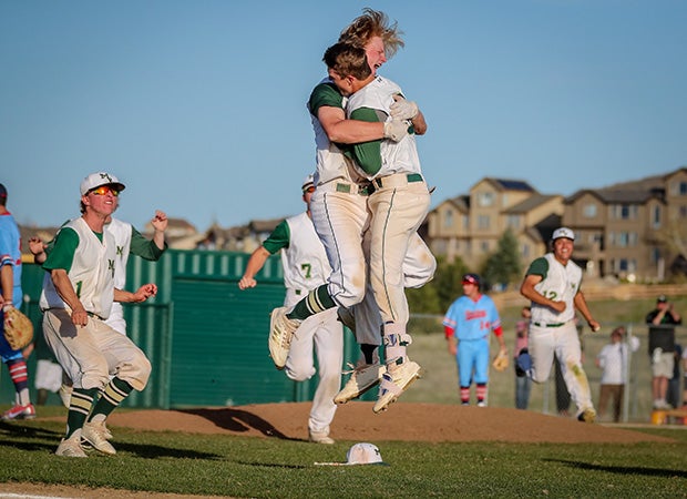 Drew Stahl and Zach Paschke of Mountain Vista (Colo.) celebrate Paschke's extra-inning walk-off hit on Senior Night against Heritage. 