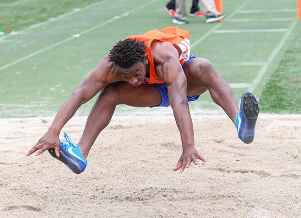 A long jumper from James Island (S.C.) reaches for the end of the pit during the Bob Jenkins Coaches Classic.   