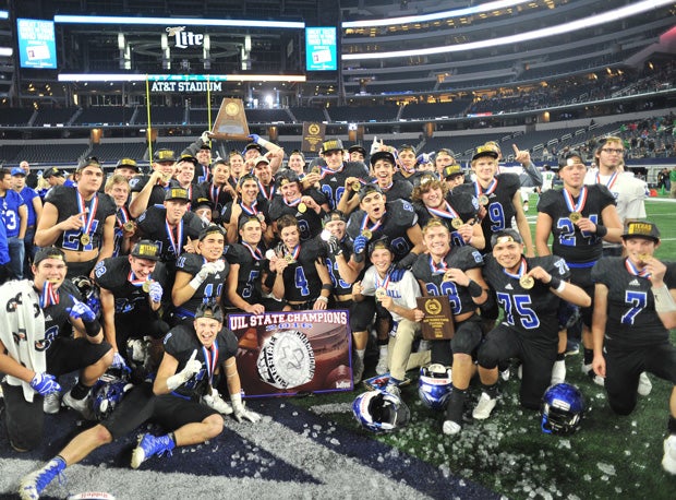 The Tigers celebrate their state title at AT&T Stadium in Dallas.