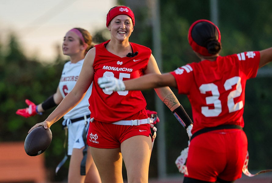 Mater Dei players celebrate a touchdown during a September game against Orange Lutheran. The Monarchs are ranked No. 11 in this week's MaxPreps Top 25 flag football rankings and are No. 1 in the latest MaxPreps Cup standings. (PHOTO: John Luciano)