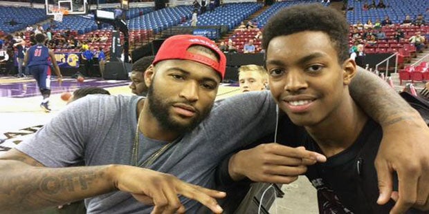 DeMarcus Cousins (left) poses with Woodcreek sophomore basketball star Jordan Brown at a Northern California high school basketball tournament in March.