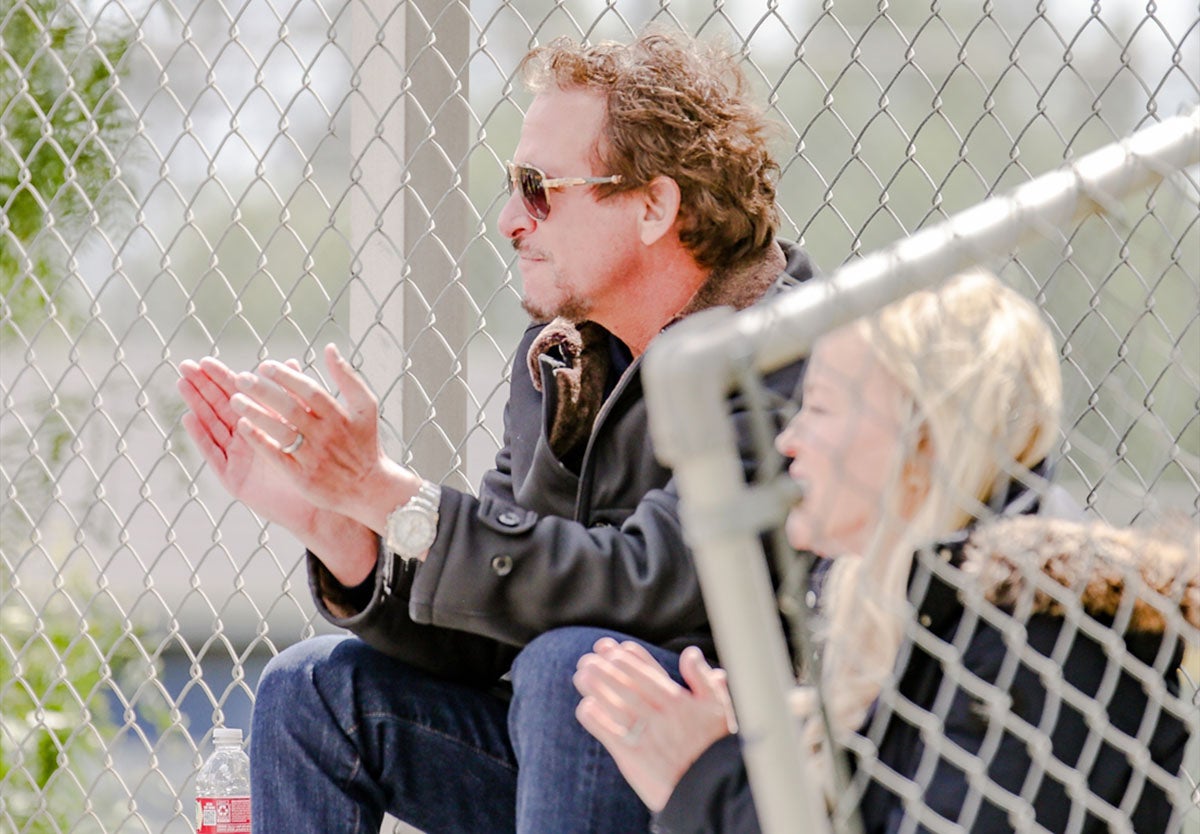 National radio host Jim Rome cheers on his son Logan Rome and the University baseball team. (Photo: Patrick Keyes)